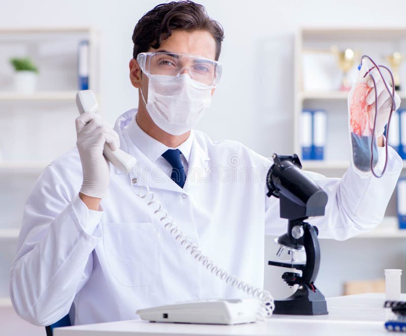 Doctor Working with Blood Samples in Hospital Clinic Lab Stock Image