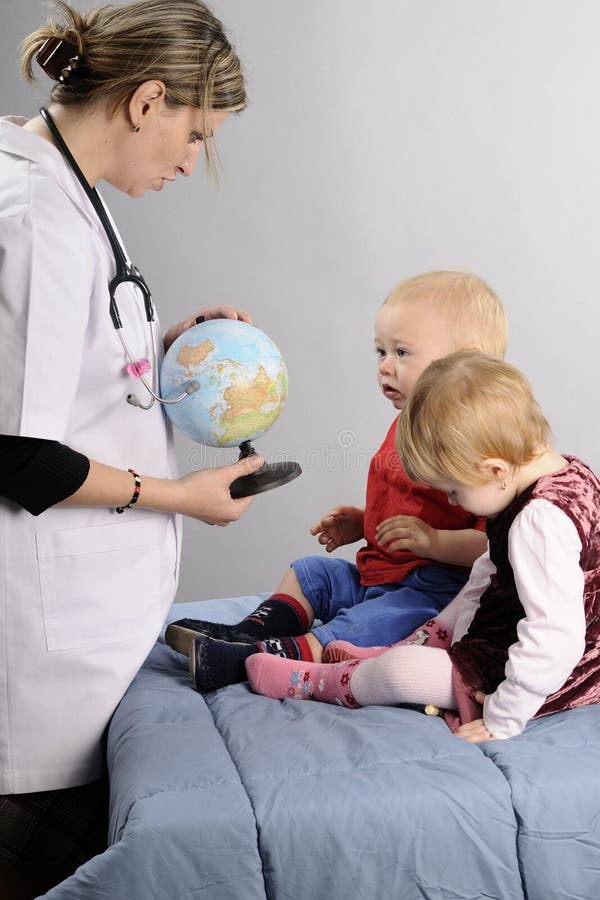 Doctor working with children