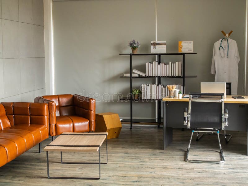 Doctor workplace in office. Modern interior of doctor`s office of gynecologist in a clinic. Clean and light interior of medical