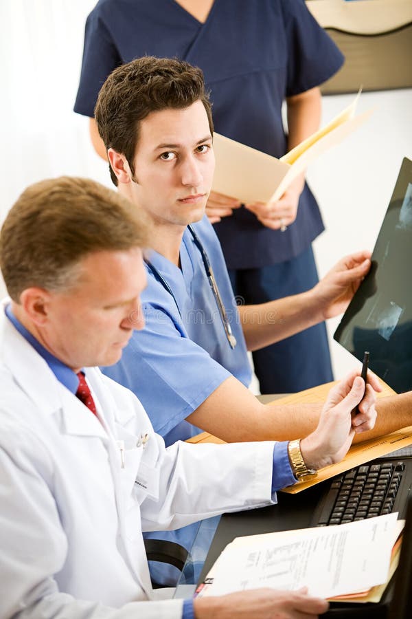 Doctors: Doctor Intern with X-ray royalty free stock photography Doctors: Doctor Intern with X-ray royalty free stock photography