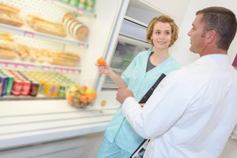 Doctors having lunch break stock photo. Image of surgeon 128024624