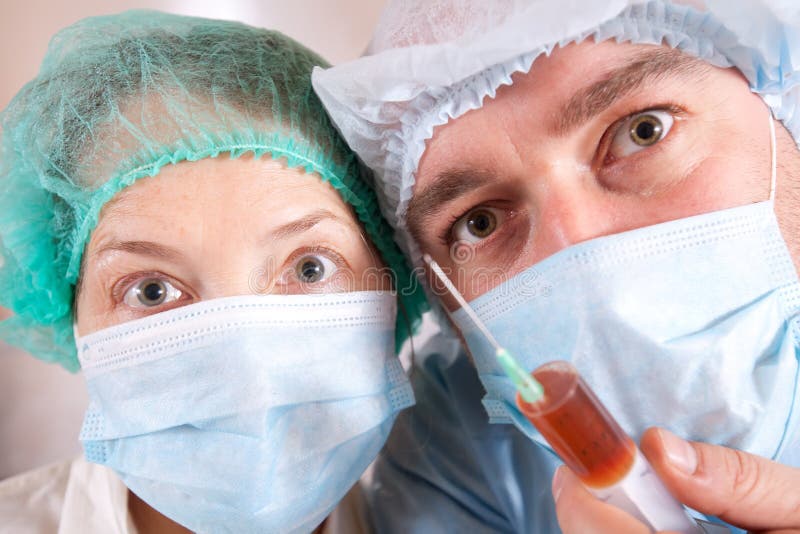 Doctors with syringe stock photo. Image of nurse, medical 21952576