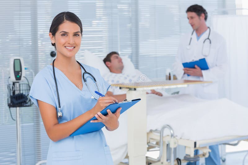 Doctors Taking Care of Patient Stock Image Image of mature