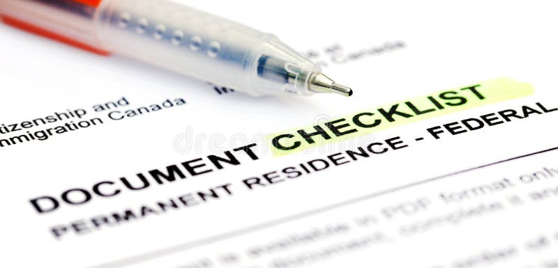 Document checklist for Visa application Canada. With a ballpoint royalty free stock images
