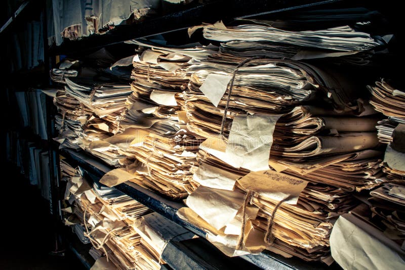 Paper documents stacked in archive. Paper documents stacked in archive