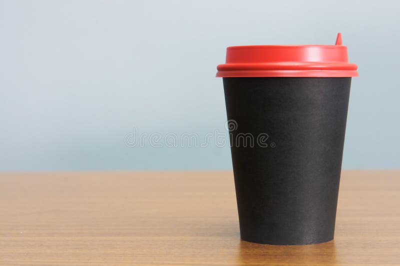Document koffiekop in zwarte met rood deksel vector illustratie Document koffiekop in zwarte met rood deksel vector illustratie