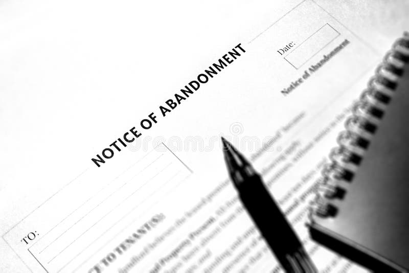 Document old style black and white. The notice of abandonment document. Paper and pen
