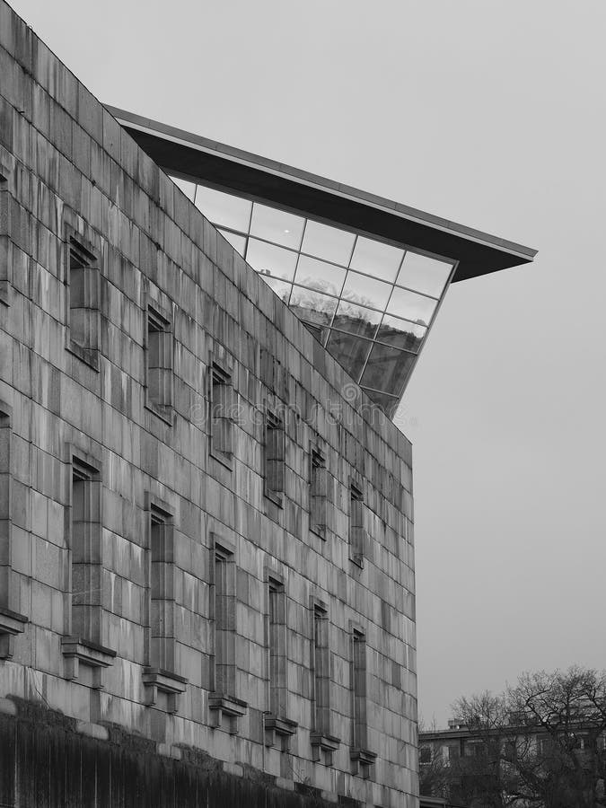 Nuremberg, Germany - 2015, April 2: The Documentation center opened 2001 towering over the former Nazi Party congress building. Nuremberg, Germany - 2015, April 2: The Documentation center opened 2001 towering over the former Nazi Party congress building.