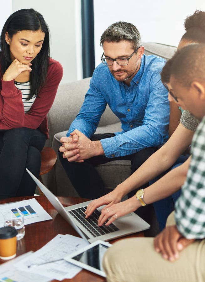 Documents, meeting and people with laptop in office for project information, review and IT research. Business, team and royalty free stock images