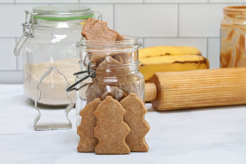 Dog cookies shaped like hydrants made with peanut butter and banana
