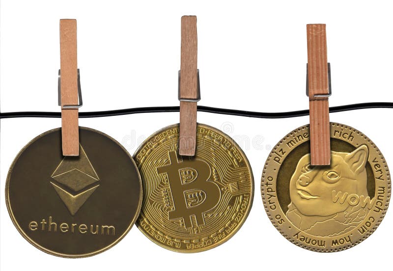 Dogecoin hung with Bitcoin and Ethereum. Dogecoin cryptocurrencies hung with clamps next to Bitcoin and Ethereum, digital economy reflected in coins. Blockchain