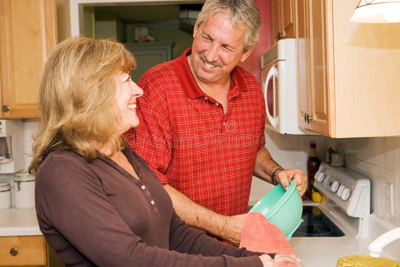 Bob Using A Sponge To Wash Dirty Dishes Clipart Cartoons By Vectortoons