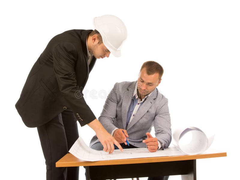 Dois contratantes de construção que discutem um modelo imagem de stock royalty free Dois contratantes de construção que discutem um modelo imagem de stock royalty free