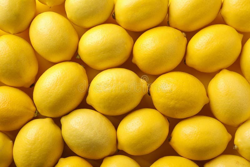 Ripe lemon fruits as background, top view. Ripe lemon fruits as background, top view