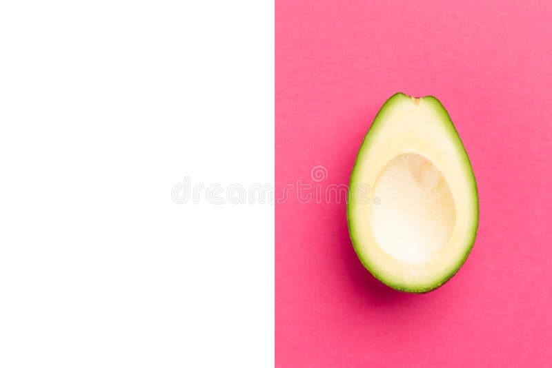 Dojrzały świeży cięcie kopcował avocado owoc w górę menchii dalej fotografia stock Dojrzały świeży cięcie kopcował avocado owoc w górę menchii dalej fotografia stock