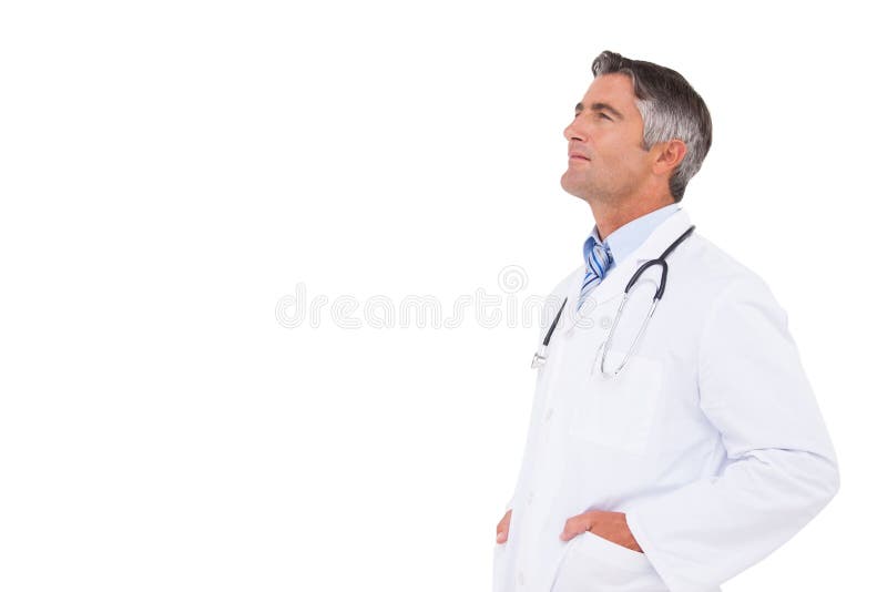 Doktor, der mit den Händen in den Taschen denkt stockfotos Doktor, der mit den Händen in den Taschen denkt stockfotos