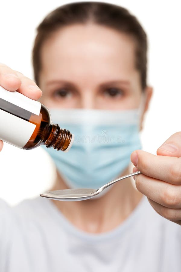 Doktor im Schablonenholding-Medizinsirup lizenzfreie stockfotografie Doktor im Schablonenholding-Medizinsirup lizenzfreie stockfotografie