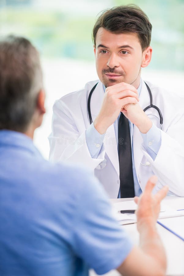 Doktor und Patient stockbilder Doktor und Patient stockbilder