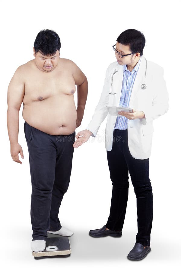 Doctor measuring the body mass of overweight men with weigher. isolated on white. Doctor measuring the body mass of overweight men with weigher. isolated on white