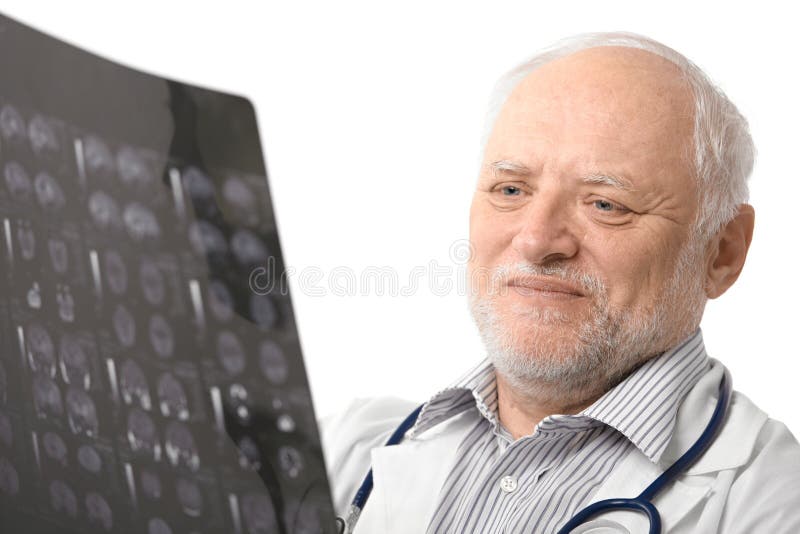 doktorsbild som ser ståendestrålpensionären x fotografering för bildbyråer doktorsbild som ser ståendestrålpensionären x fotografering för bildbyråer