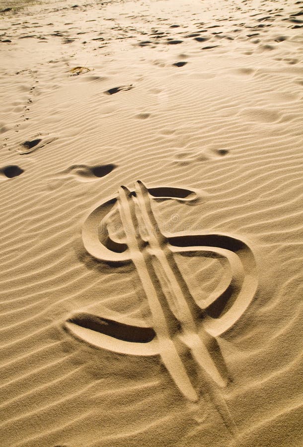Dollar sign in the sand. Dollar sign in the sand