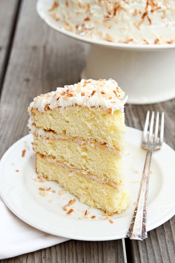 Three layer coconut cake with frosting. Three layer coconut cake with frosting.