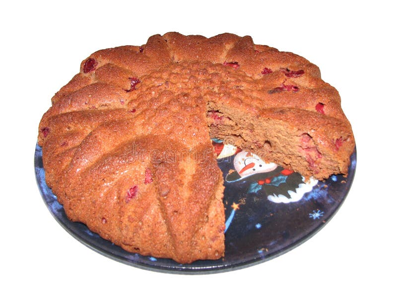 Isolated cranberry cake on a Christmas plate with a snowman. Isolated cranberry cake on a Christmas plate with a snowman.