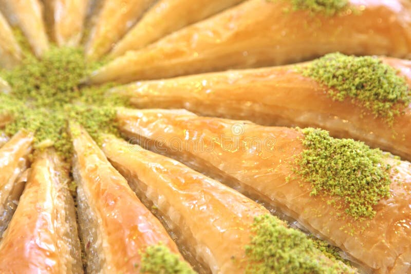 Delicious Turkish sweet, baklava with green pistachio nuts, macro shot. Delicious Turkish sweet, baklava with green pistachio nuts, macro shot