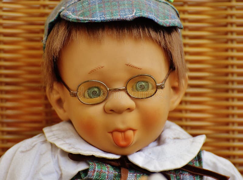 Doll Wearing Eyeglasses Picture. Image 109885781