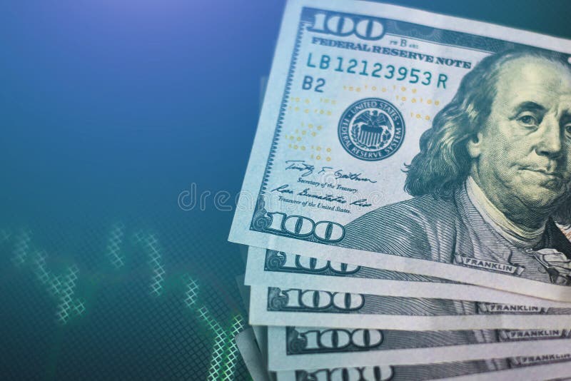Dollar banknotes against stock market or forex trading graph and a candlestick chart, toned photo. Economy trends concept royalty free stock photography Dollar banknotes against stock market or forex trading graph and a candlestick chart, toned photo. Economy trends concept royalty free stock photography