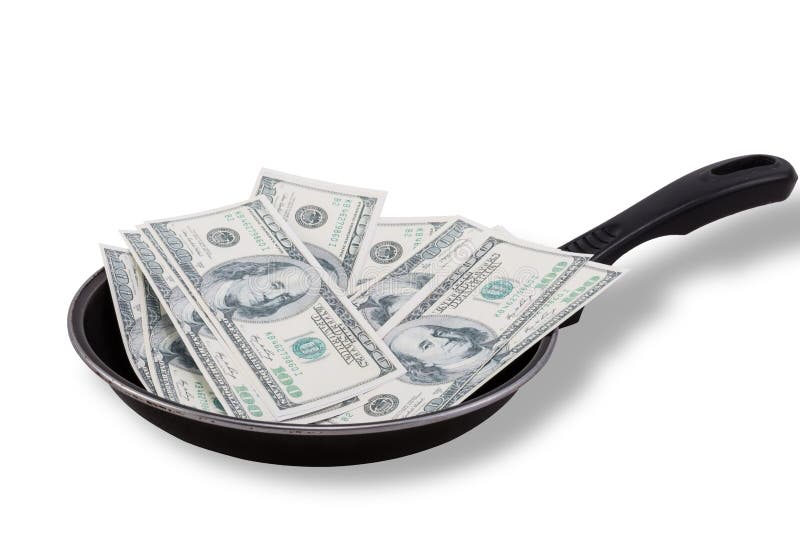 Dollar bills in Non stick frying pan stock photography