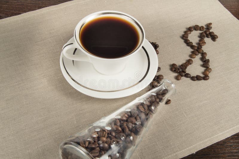 Dollar Coffee is Created from Coffee Beans. Cup of Coffee and a Glass