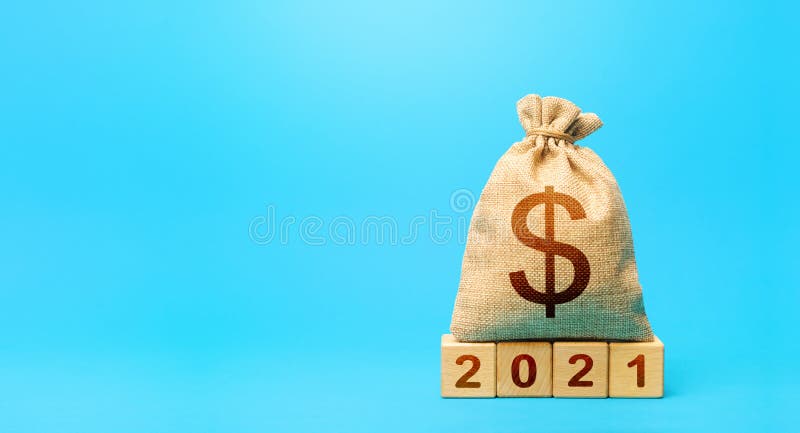 Dollar money bag and blocks 2021. Budget planning for next year. Beginning of new decade. Business plans and development prospects, trends and challenges. Revenues expenses, investment and financing. Dollar money bag and blocks 2021. Budget planning for next year. Beginning of new decade. Business plans and development prospects, trends and challenges. Revenues expenses, investment and financing