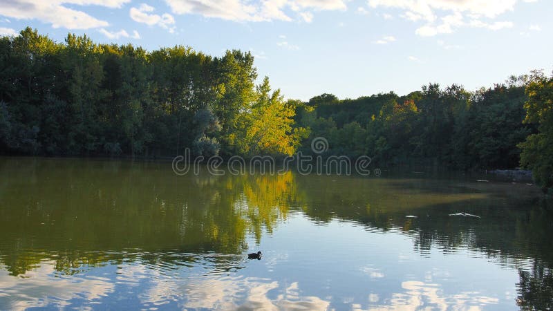 Dollard-Des-Ormeaux Park Centennial Lake Sunrise Beautiful Fall colors. Dollard-Des-Ormeaux Park Centennial Lake Sunrise Beautiful Fall colors.