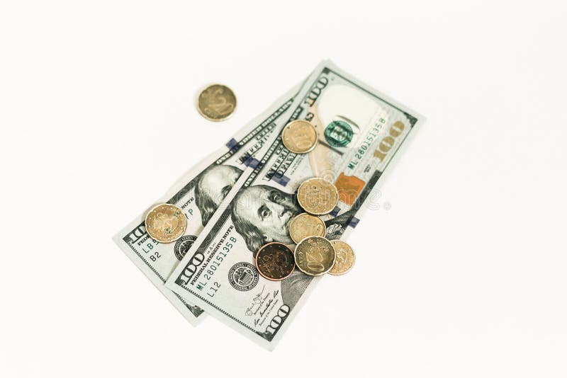 Dollari e centesimi isolati su fondo bianco fotografia stock Dollari e centesimi isolati su fondo bianco fotografia stock