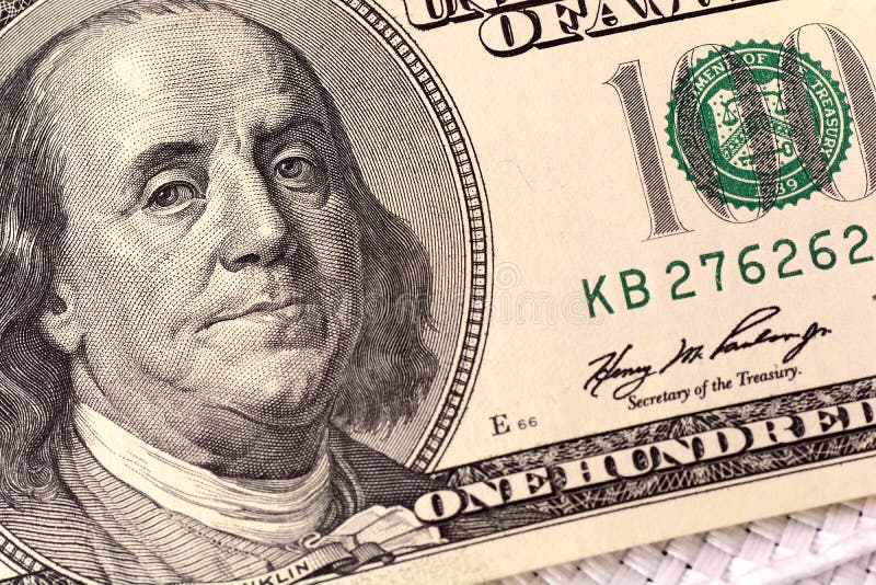 Dollars closeup. Benjamin Franklin portrait on one hundred dollar bill