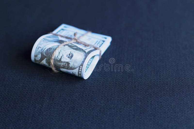 Dollars dans un paquet image stock Dollars dans un paquet image stock