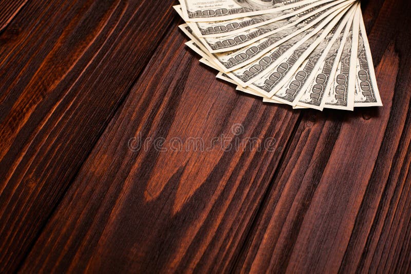 Dollars on wooden table stock photo. Image of sign, banking 50245984