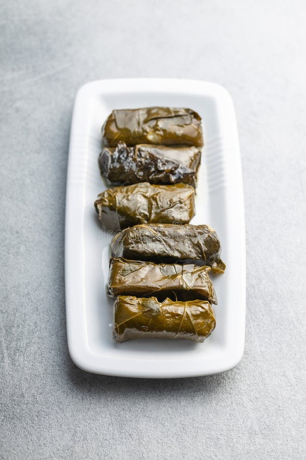 Dolmades. Stuffed Vine Leaves. Greek Appetizer on Plate Stock Photo