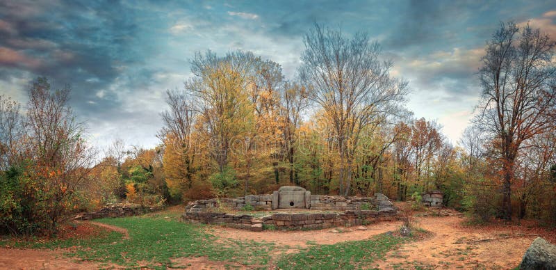 Dolmen in the forest, the valley of the river Janet. Russia.