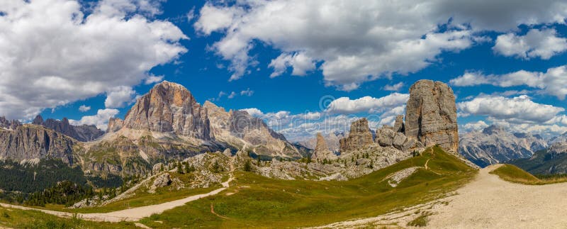 Dolomites rocky tower mountain in Italian Alps, Trentino Alto Adige, Italy. Alps, alpine scenic landscape. Dolomites rocky mountain in Alps at Cortina di Ampezzo. Dolomites rocky tower mountain in Italian Alps, Trentino Alto Adige, Italy. Alps, alpine scenic landscape. Dolomites rocky mountain in Alps at Cortina di Ampezzo