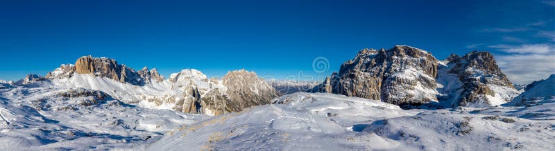 Dolomites rocky tower mountain in Italian Alps, Trentino Alto Adige, Italy. Alps, alpine scenic landscape. Dolomites rocky mountain in Alps at Cortina di Ampezzo winter landscape. Dolomites rocky tower mountain in Italian Alps, Trentino Alto Adige, Italy. Alps, alpine scenic landscape. Dolomites rocky mountain in Alps at Cortina di Ampezzo winter landscape