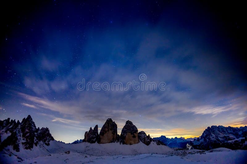 Dolomites rocky tower mountain in Italian Alps, Trentino Alto Adige, Italy. Alps, alpine scenic winter snow landscape. Dolomites rocky mountain in Alpes at Cortina di Ampezzo. Tre Cime view from North. Dolomites rocky tower mountain in Italian Alps, Trentino Alto Adige, Italy. Alps, alpine scenic winter snow landscape. Dolomites rocky mountain in Alpes at Cortina di Ampezzo. Tre Cime view from North