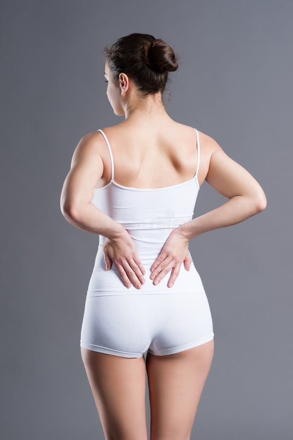 Dolor de espalda, inflamación del riñón, dolor en cuerpo del ` s de la mujer imagenes de archivo Dolor de espalda, inflamación del riñón, dolor en cuerpo del ` s de la mujer imagenes de archivo