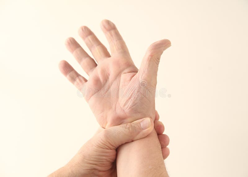 Dolor de la muñeca fotografía de archivo libre de regalías Dolor de la muñeca fotografía de archivo libre de regalías