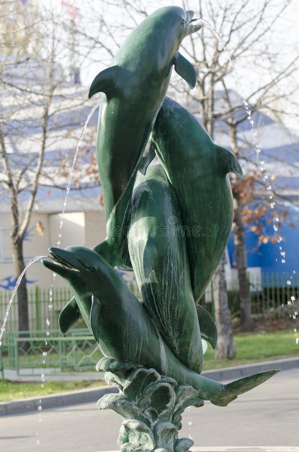Dolphin fountain stock image. Image of spray, park, tourism 34810423