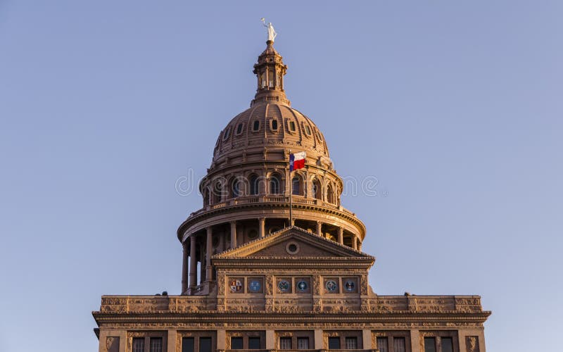 Dome of capitol building with one star flag in Austin, Texas, US