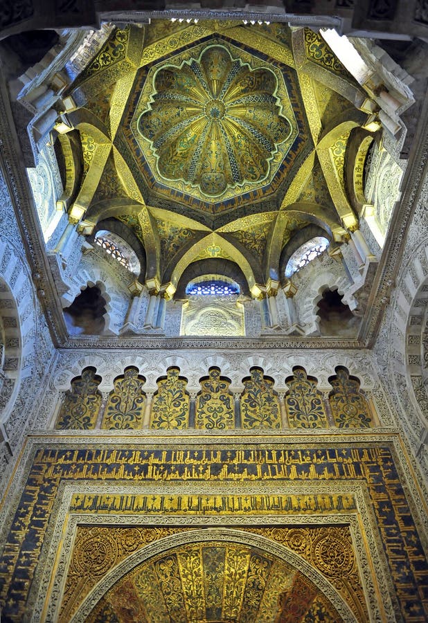 Mihrab indicates the location to where you have to look when pray, old mosque in Cordoba beautifully ornamented with byzantine mosaics, Andalusia, Spain. Mihrab indicates the location to where you have to look when pray, old mosque in Cordoba beautifully ornamented with byzantine mosaics, Andalusia, Spain.