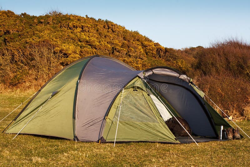 Dome tent pitched in field stock photo