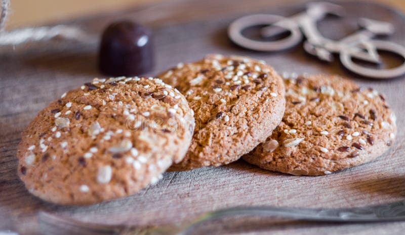 Homemade fresh oats cookies with sesame and milk stock photography Homemade fresh oats cookies with sesame and milk stock photography